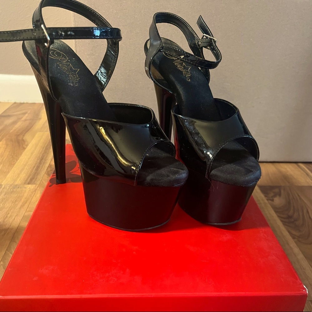 All black pleaser heels. Size 8!
